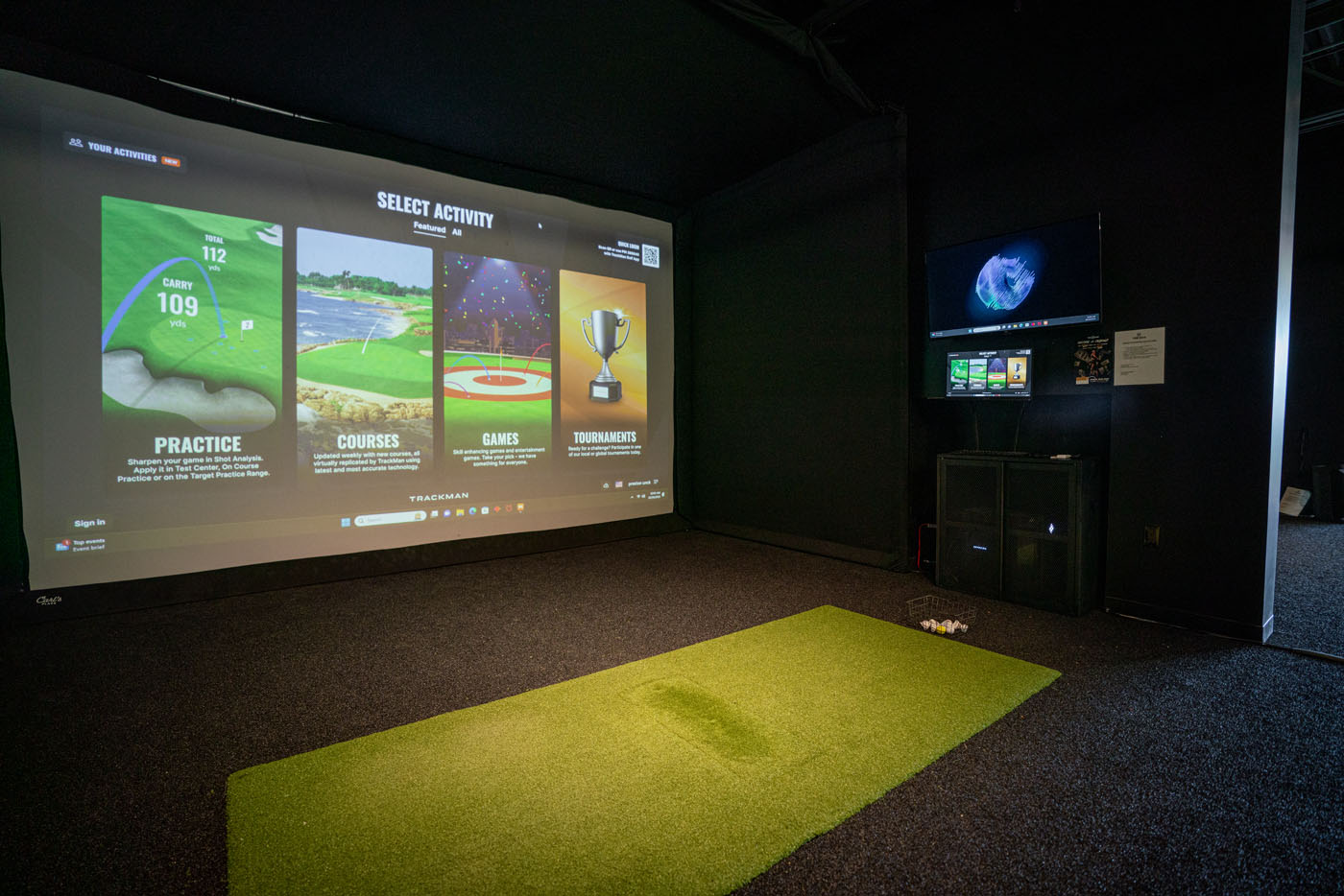 Tee Box virtual golf hitting bays.